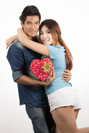 happy young couple shooting in studioの写真素材