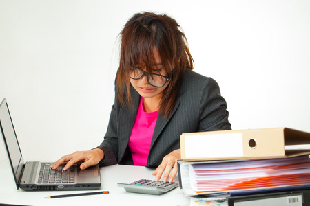 asian woman working hard の写真素材