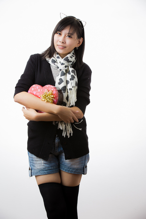 asian woman valentines day giving and receiving giftの写真素材