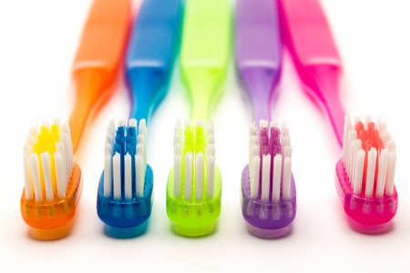 colorful toothbrush shooting in white backgroundの写真素材