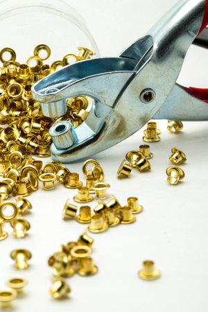 brass eyelet shooting in white background
