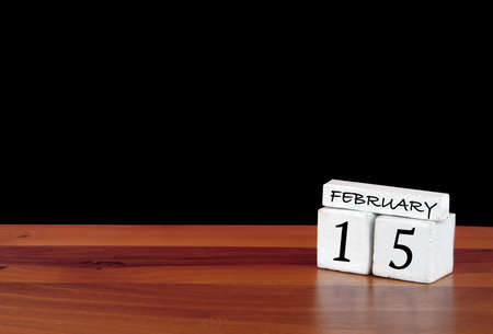 15 February calendar month. 15 days of the month. Reflected calendar on wooden floor with black backgroundの写真素材