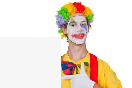 Clown showing white billboard - isolatedの写真素材