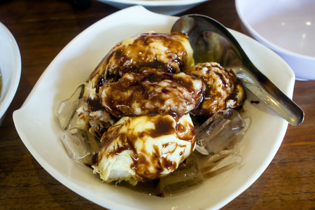 This is a bowl of ice durian dessert served with fresh seem tasty and deliciousの写真素材