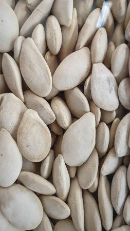 White sunflower seeds snacks are photographed closely