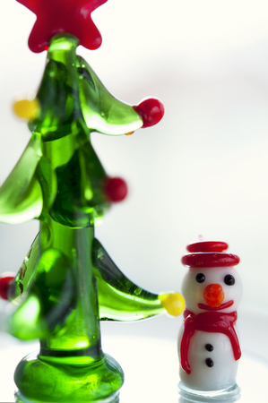 Crystal glass christmas decor - christmas tree fir and snowmanの写真素材