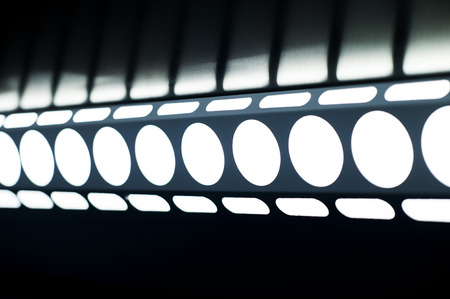 Abstract circle geometric curves background. Indoors lighting.