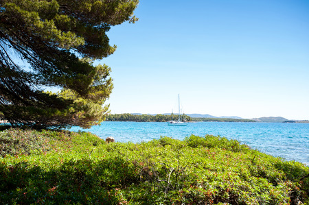 Stunning view of landscape with beautiful Adriatic Sea and quiet majestic bay with floating boats in Dalmatia, Croatia, Europe. Summertime multicolored vibrant outdoors inspirational horizontal imageの写真素材