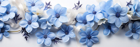 Mockup image close up blue flowers and silk on white fabric background. Banner, card, invitation and branding design concept Top view. Flat lay. Copy space for text AI generatedの素材
