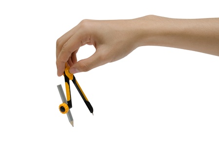 a hand holding a compassの写真素材