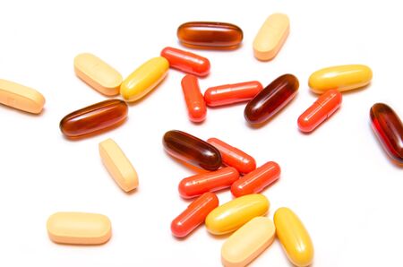 different kinds of medicine on the white backgroundの写真素材