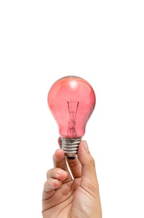 a hand holding a red lightbulbの写真素材