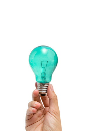 a hand holding a blue lightbulbの写真素材