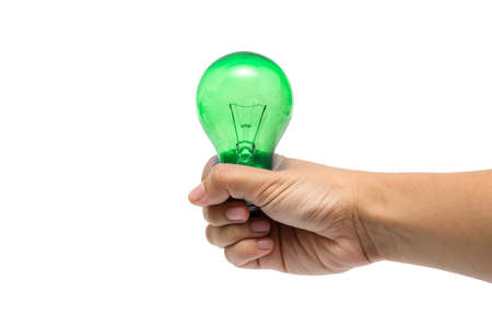 a hand holding a green lightbulbの写真素材