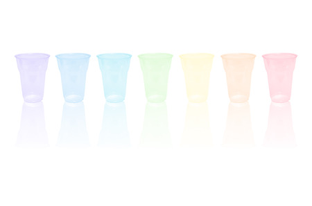 empty rainbow transparent disposible glassesの写真素材