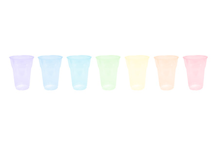 empty rainbow transparent disposible glassesの写真素材