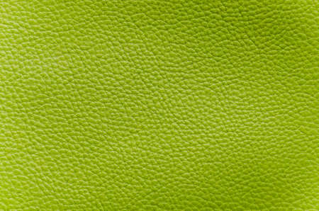closeup of detailed green artificial leatherの写真素材