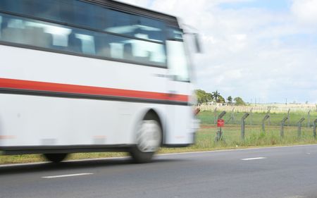 Blurred motion of bus in movementの写真素材
