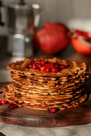 Round wafers stacked pile shot close-up in studioの写真素材