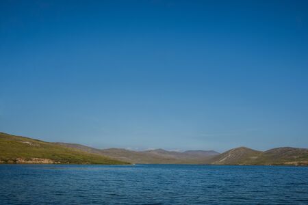 Baikal lake near Khuzhir villahe at Olkhon island in Siberia, Russia. Lake Baikal is the largest...
