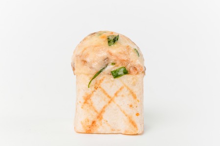 Japanese cuisine. One peace of sushi roll isolated on white background Closeup shotの写真素材