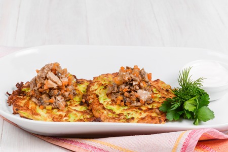 Draniki with mushroom caviar filmed in decorの写真素材