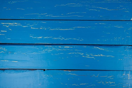 Blue wooden background for advertising inscription shot from above close-upの写真素材