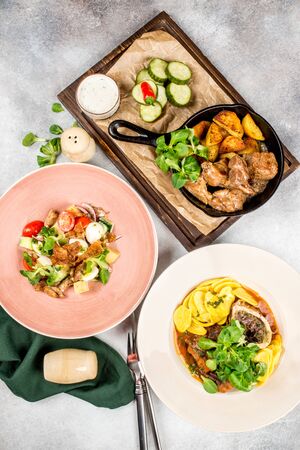 Three dishes from the menu for the restaurantの写真素材