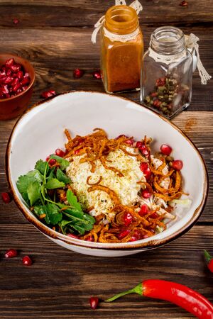 Georgian salad with pomegranate and fresh herbsの写真素材