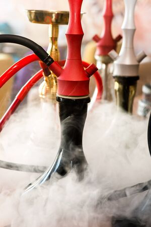Hookah and attributes to it are shot in the interior. Close-up shot