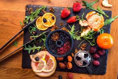 Hookah and attributes to it are shot in the interior. Close-up shotの写真素材