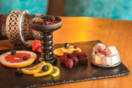 Hookah and attributes to it are shot in the interior. Close-up shotの写真素材
