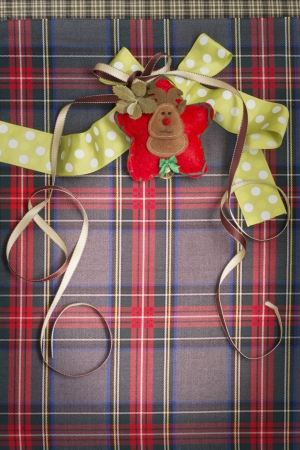 Tartan texture with polka dots and yellow ribbon  Vertical imageの写真素材