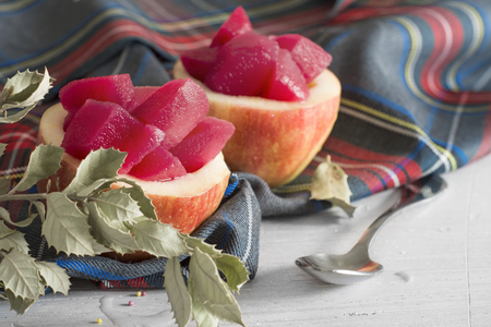 Apples stuffed with cream  Dice fruit, impregnating in you red fruit  Tartan の写真素材