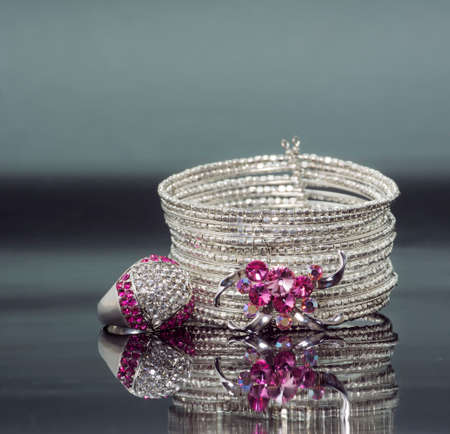 silver bracelet with pink crystal stones and ring  horizontal imageの写真素材