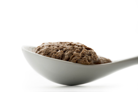 Spoon portion of musse white chocolate and white backgroundの写真素材