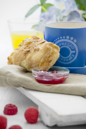 breakfast, pasta for you, with jam and butter, coffee cup blue and orange juiceの写真素材