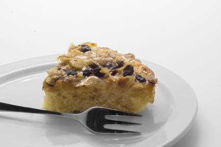 sweet cake with fruits, on white plate and background Isolatedの写真素材