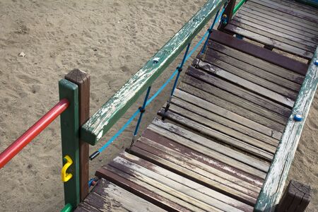 playground with wooden suspension bridgeの写真素材