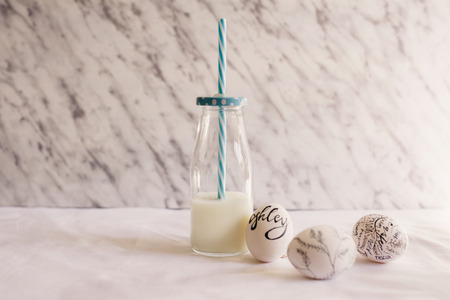 Easter eggs decorated with words, breakfast time.の写真素材