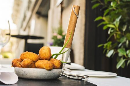 Spanish croquettes, breaded, and fried in olive oil.の写真素材
