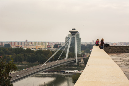 BRATISLAVA, SLOVAKIA: OCTOBER 02, 2016: The SNP, New bridge across the Danube river, panoramic view of the city from Bratislava castle, Slovakiaのeditorial素材