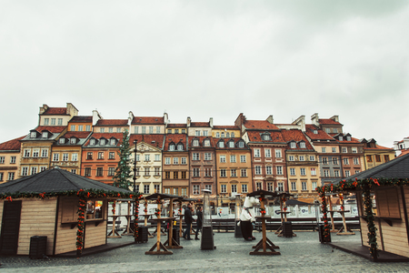 Christmas market in Warsaw Old Town Market Square, detail of the old colorful facadesのeditorial素材