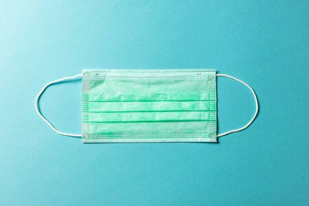 Disposable Surgical mask with rubber ear straps. Typical 3-ply surgical mask to cover the mouth and...