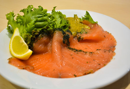 salmon salad on the dishの写真素材