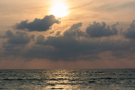 dramatic sunset at the seaの写真素材