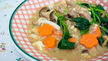 Fried noodle with pork and broccoli on backgroundの写真素材