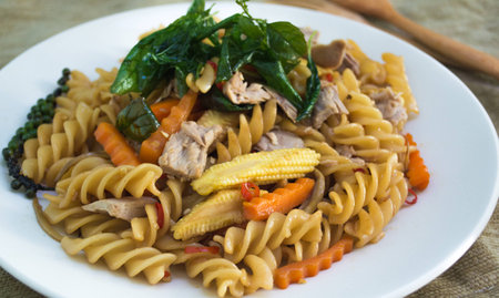 spiciy spaghetti sauce and basil on backgroundの写真素材