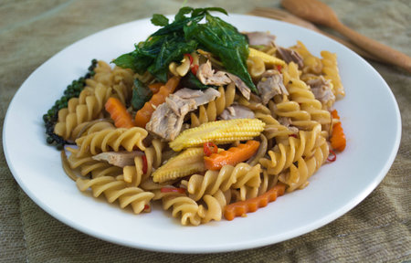 spiciy spaghetti sauce and basil on backgroundの写真素材