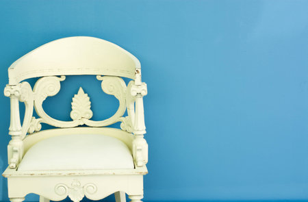 white luxury chair on blue backgroundの写真素材